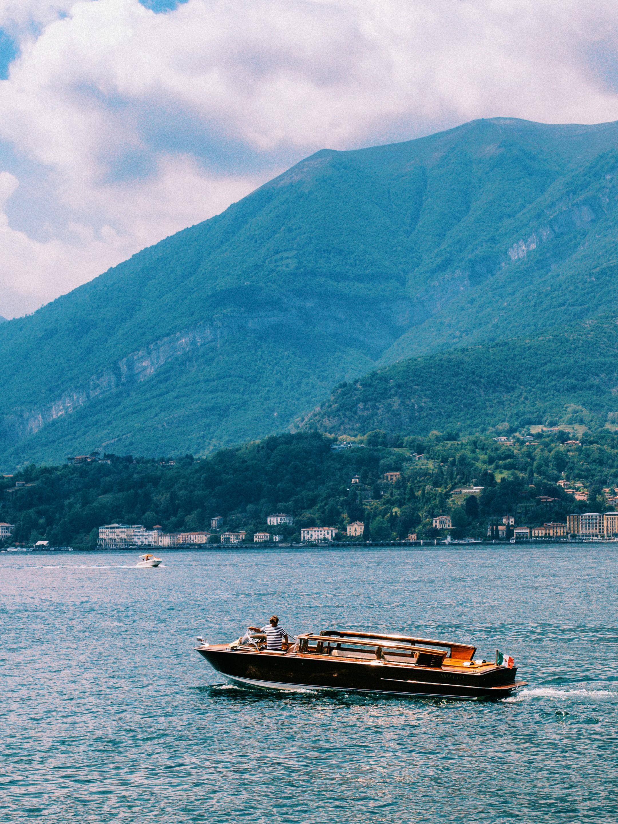 Friends laughing and posing inside a car