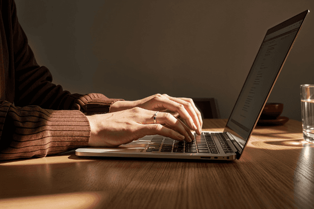 3d orange and pick cup with a blue background