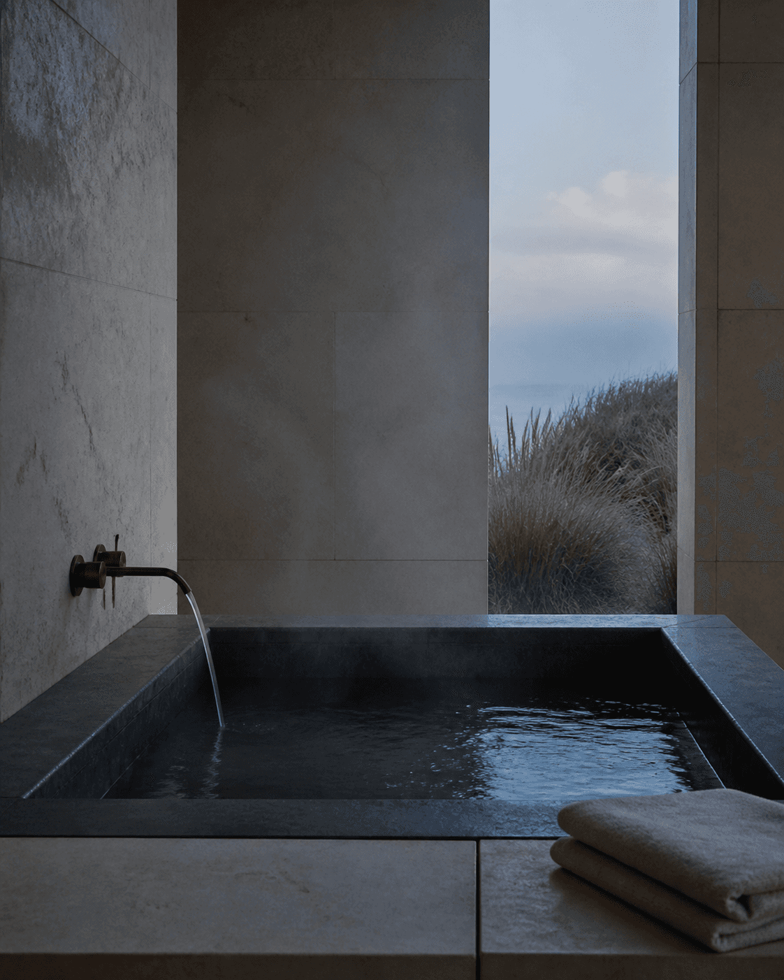 Tidehouse stone bathhouse at blue hour