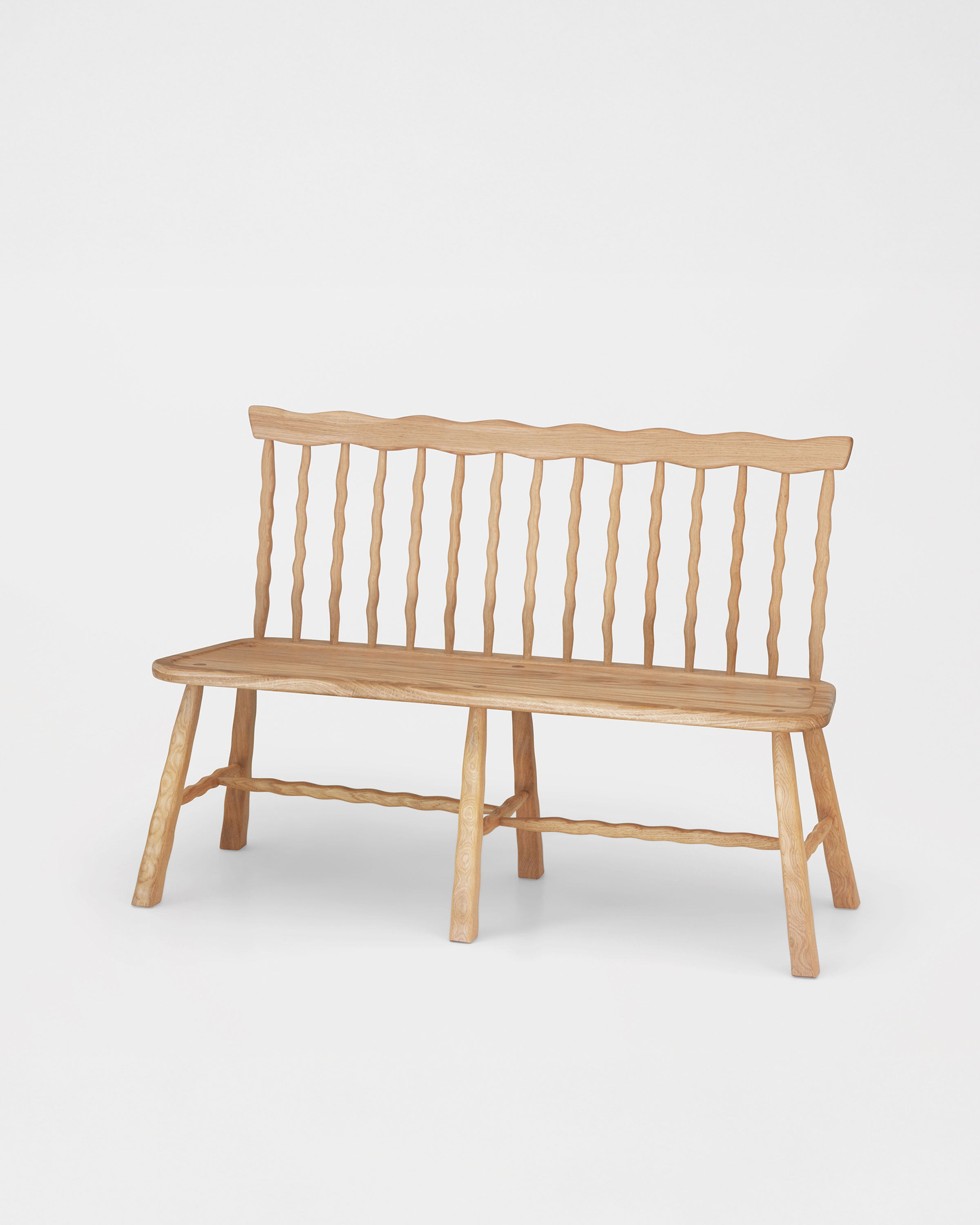 Windsor Bench in Oak on a white background