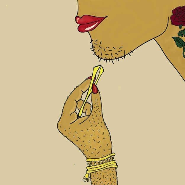 A woman smiling at the camera in a cafe