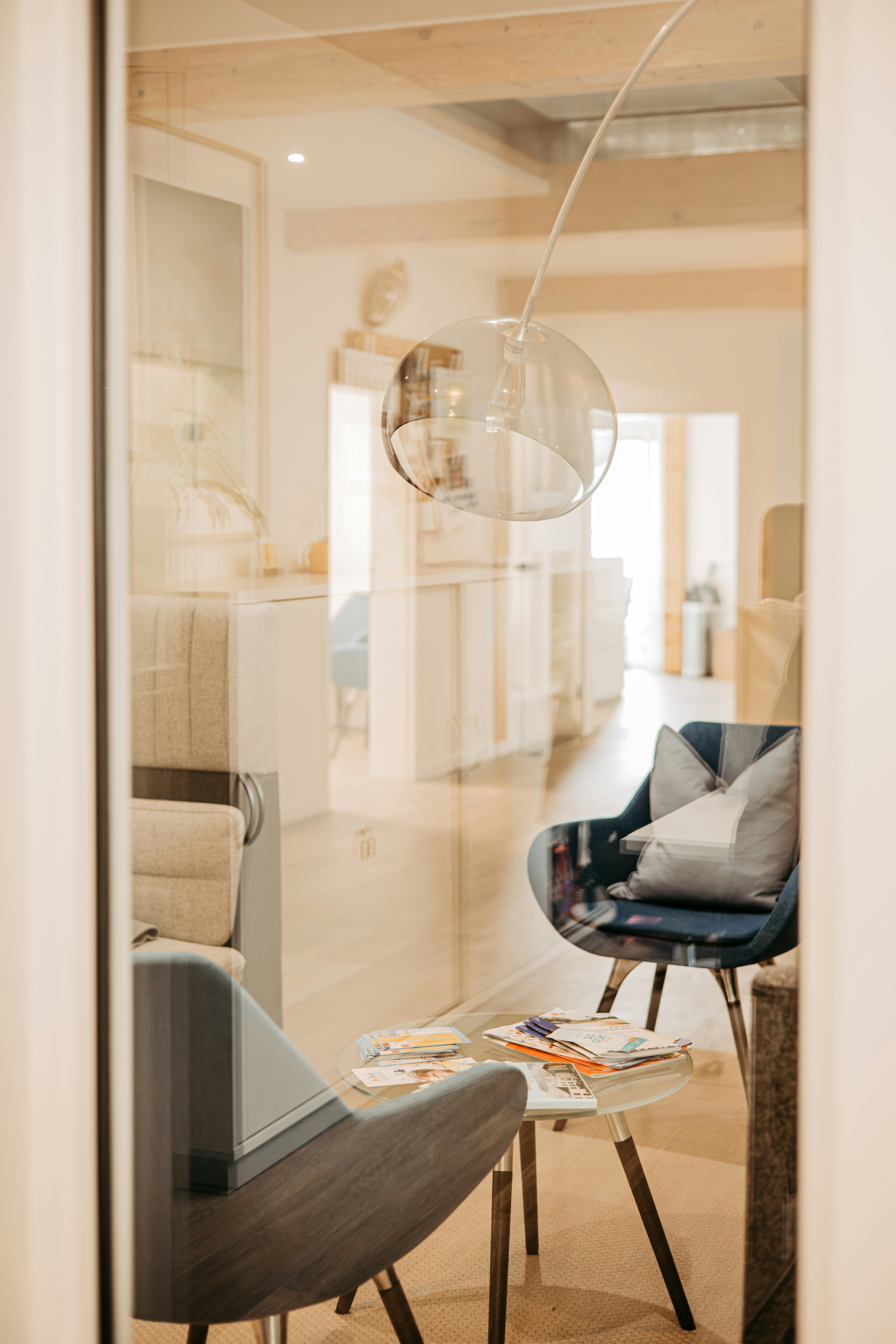 A living room filled with furniture and a large window