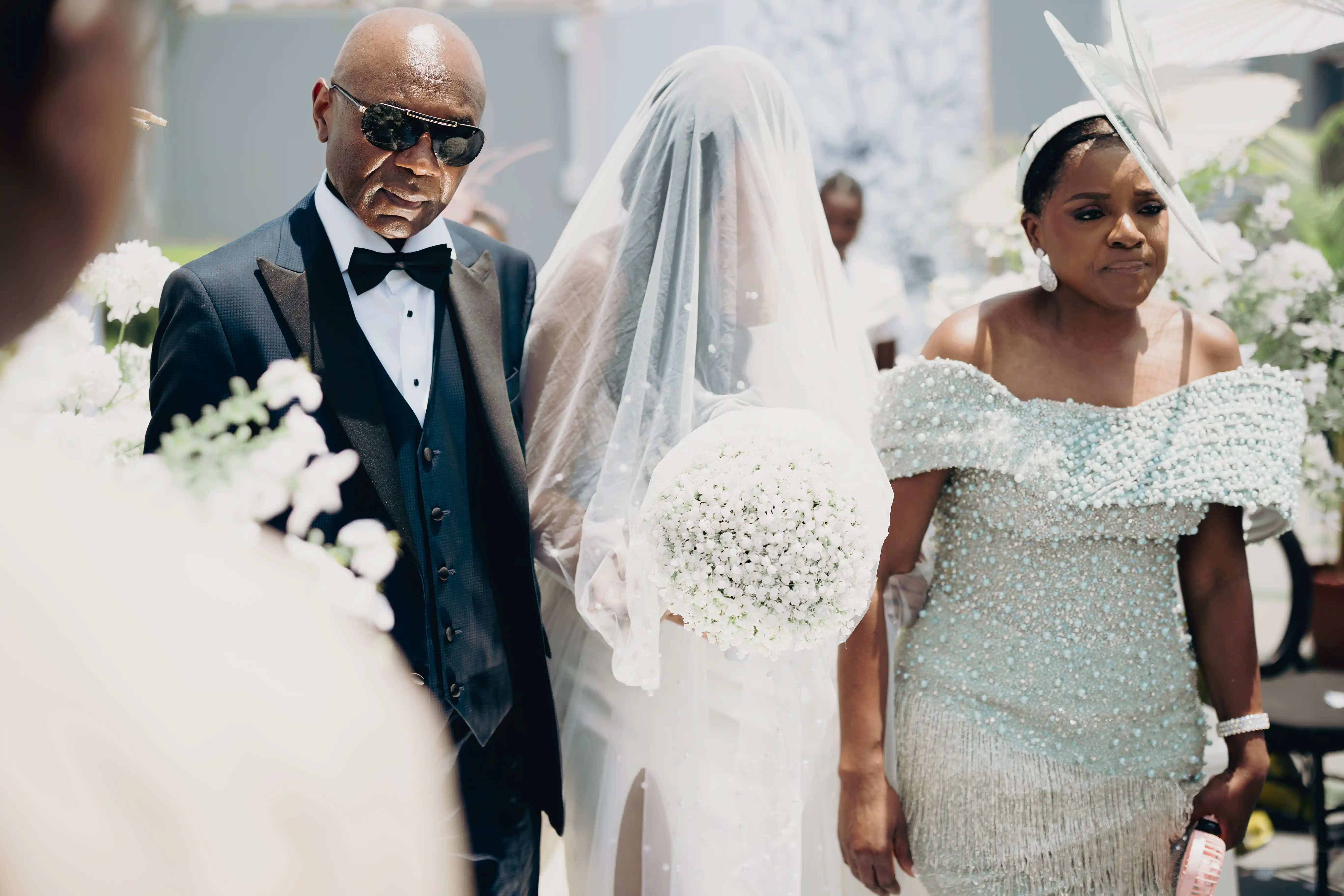 Bride and groom celebrating a luxury wedding coordinated by Victoria Brooks Events, a premium wedding planner in Nigeria.