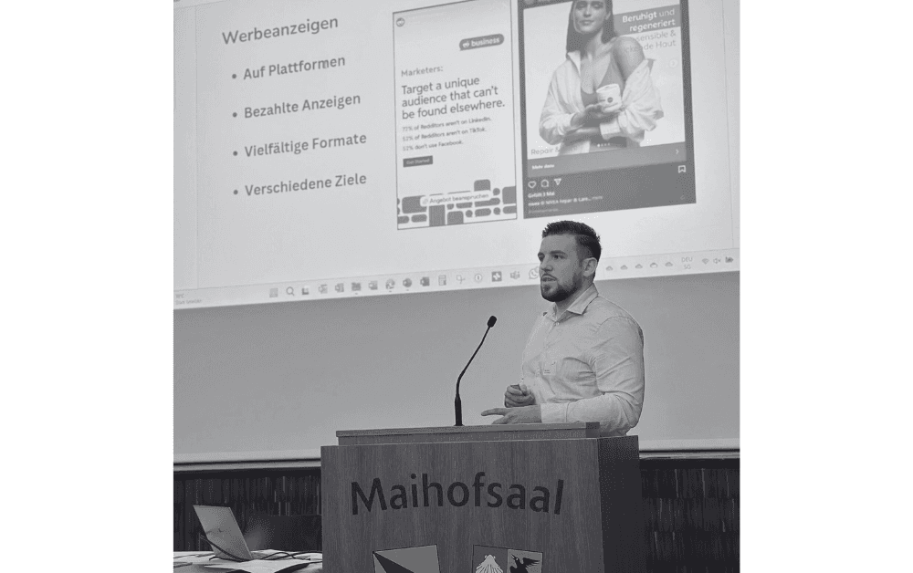 Interior of a cafe or workspace with several people at tables