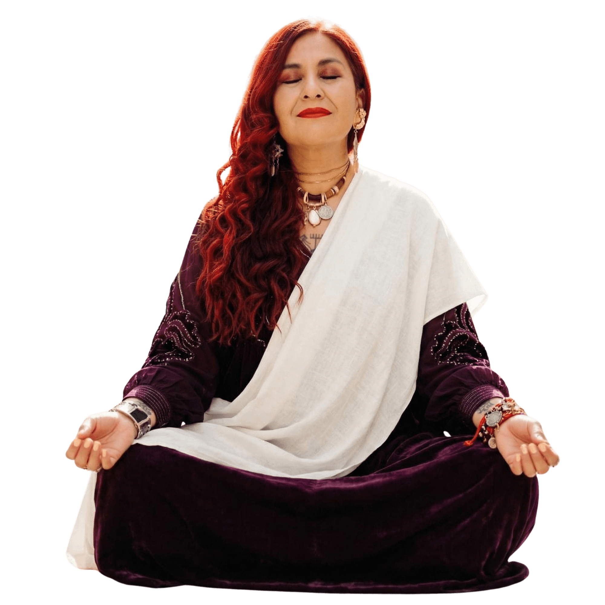 A woman sits cross-legged with eyes closed, wearing a white blouse and a long purple skirt, looking serene.