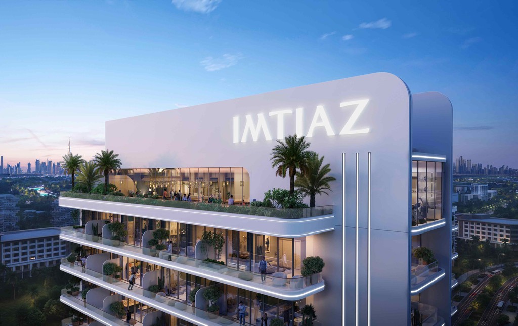 Aerial perspective of Le Blanc by Imtiaz, showcasing its height amidst the urban city environment.