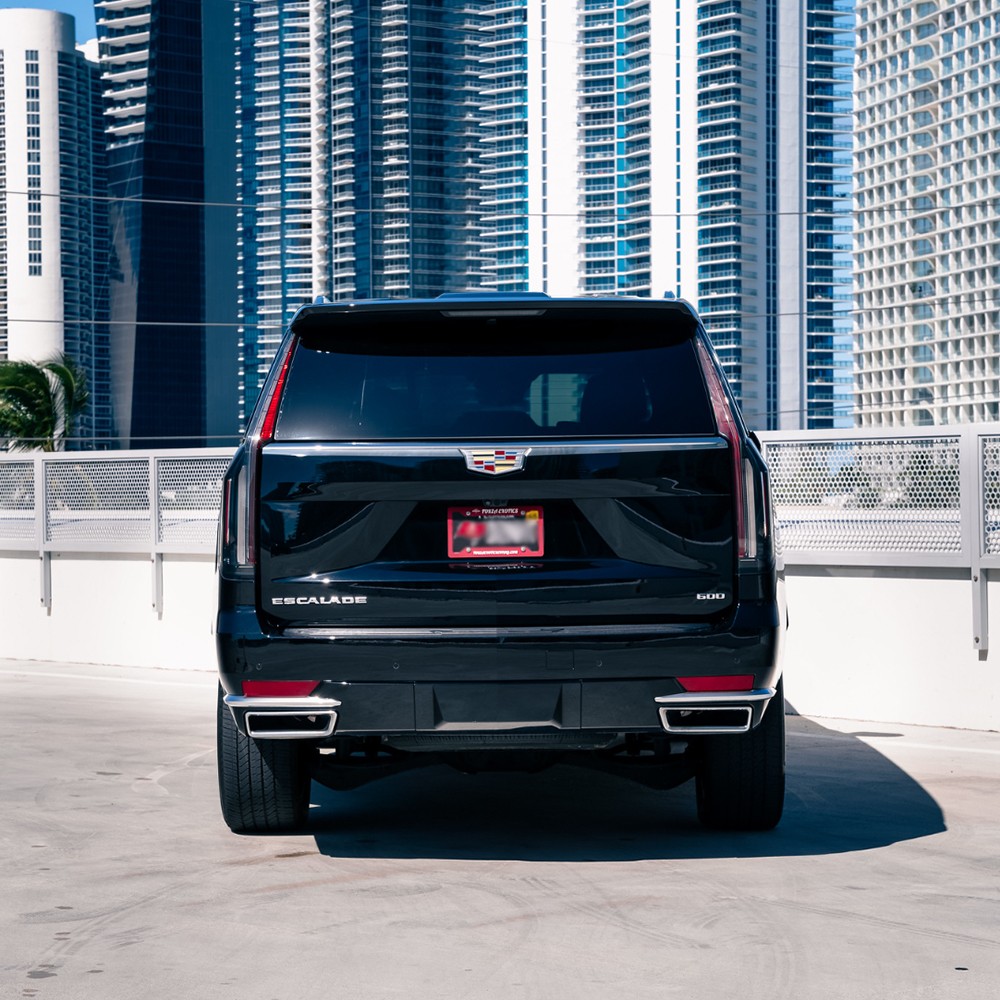 Rear view of Cadillac Escalade showing taillights and full extended body