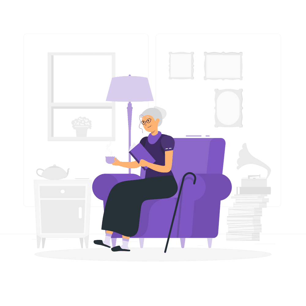 An elderly woman sitting comfortably on an armchair, holding a book in one hand and a cup in the other.