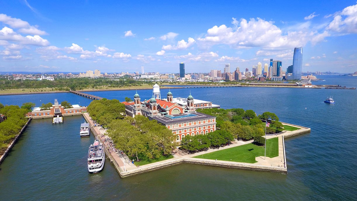 a view of a city with a large body of water in the background