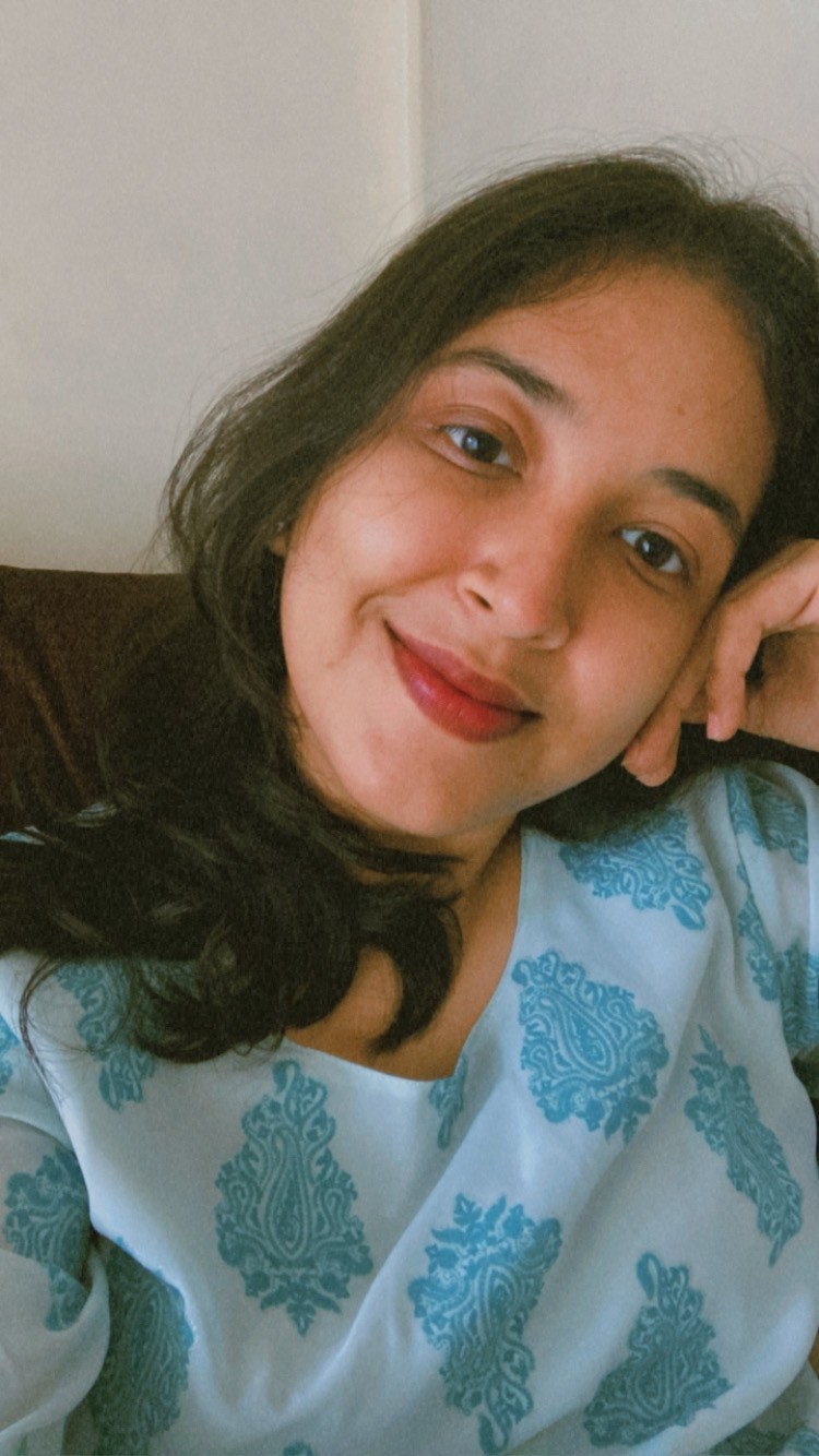 Vithika, co-founder and brand designer at Visual Mess Studio — brand identity and Framer website design studio for artists and handmade creative businesses