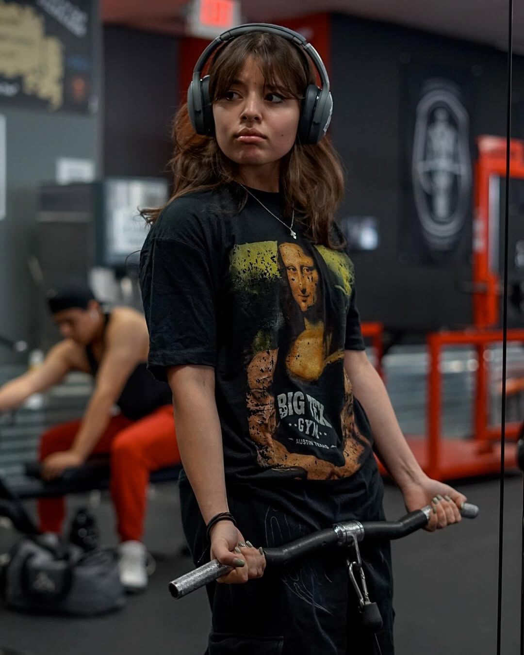 Girl wearing mona lisa big tex tshirt