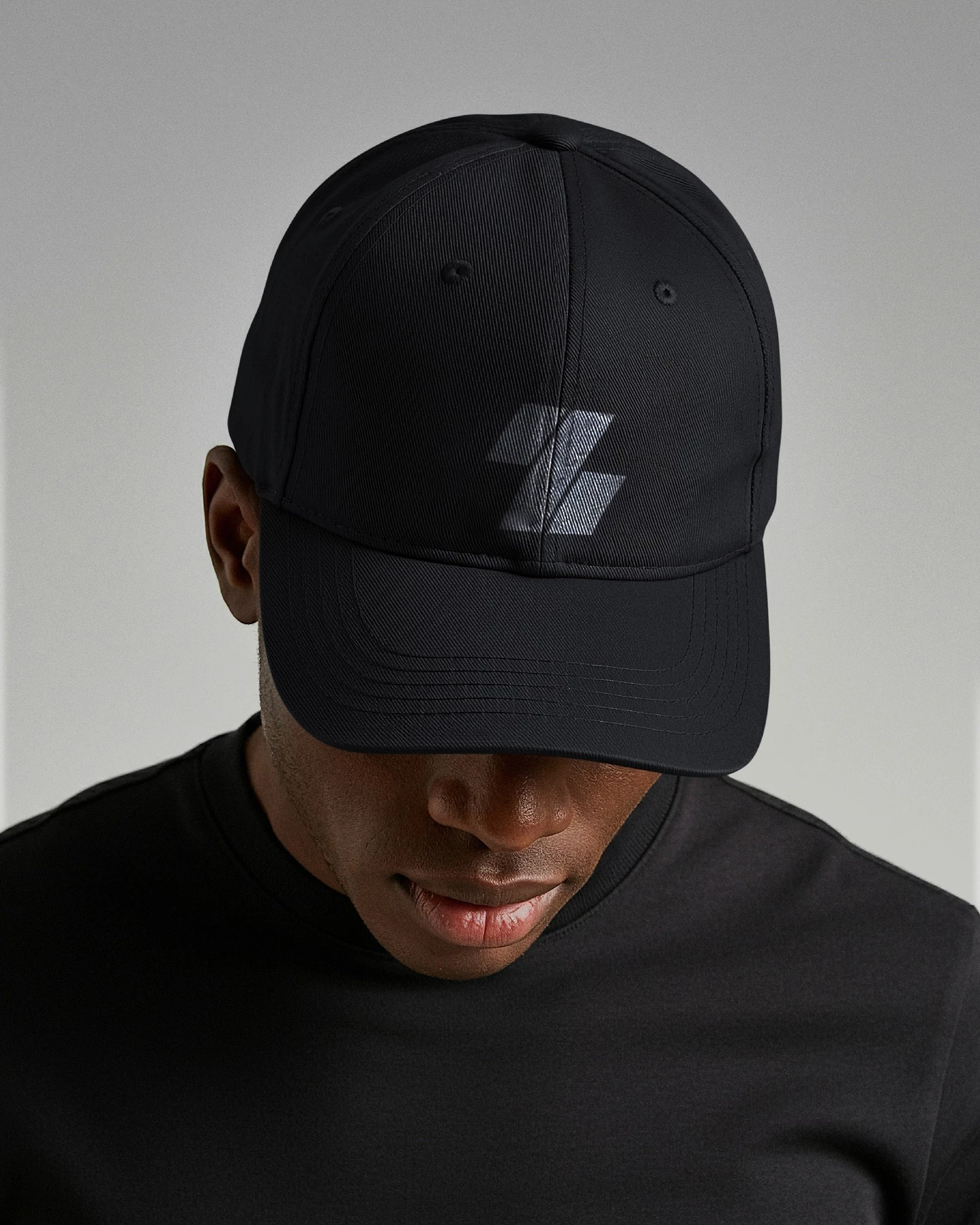 Model holding the same posture beside the car, turned to face the opposite side, evoking a cinematic and contemplative mood.