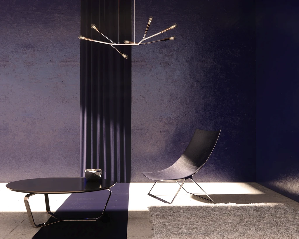A chair and table in a room with purple walls.