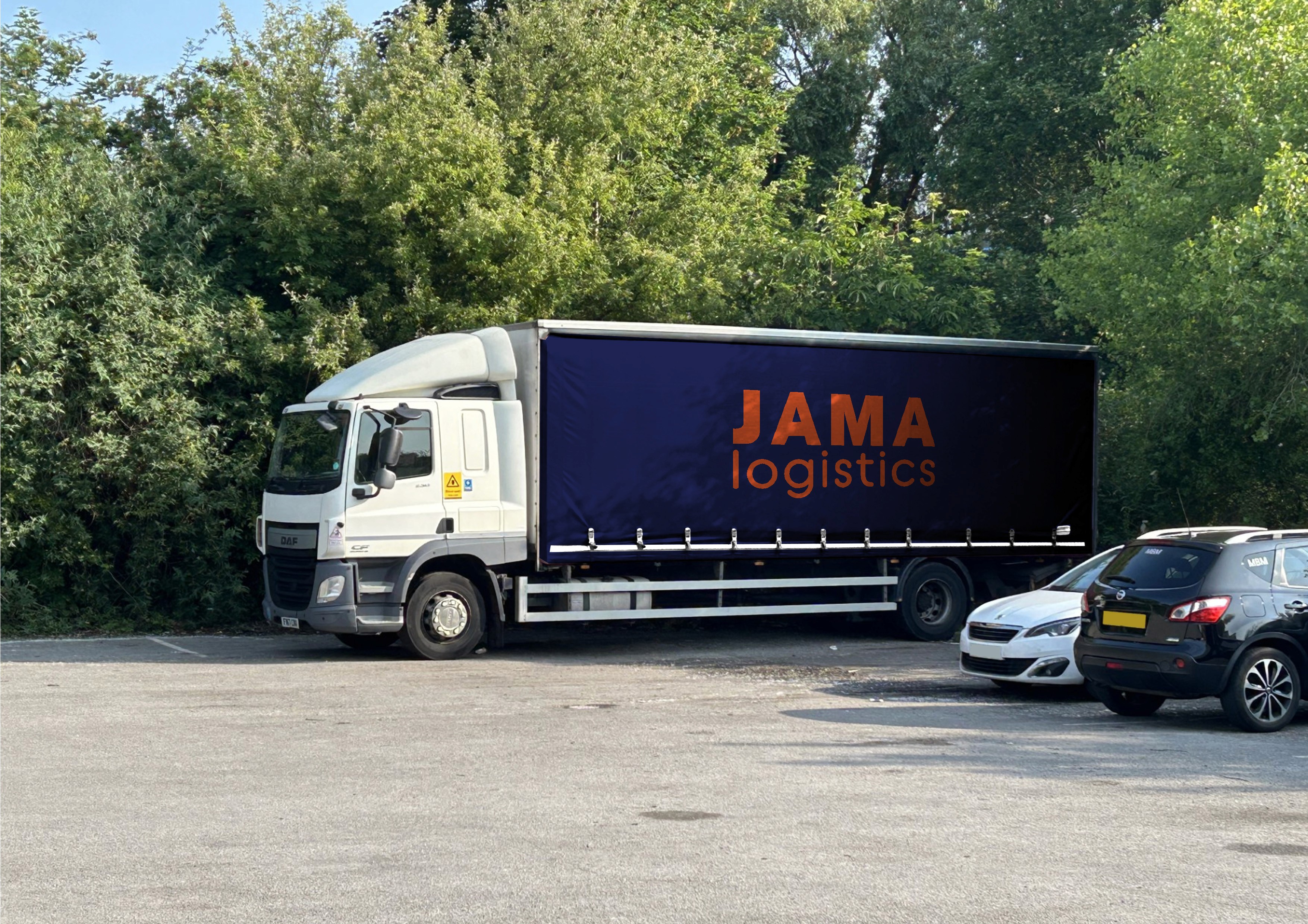 picture of a 44 tonne artic lorry parked in a warehouse yard with jama logistics livery on the trailer