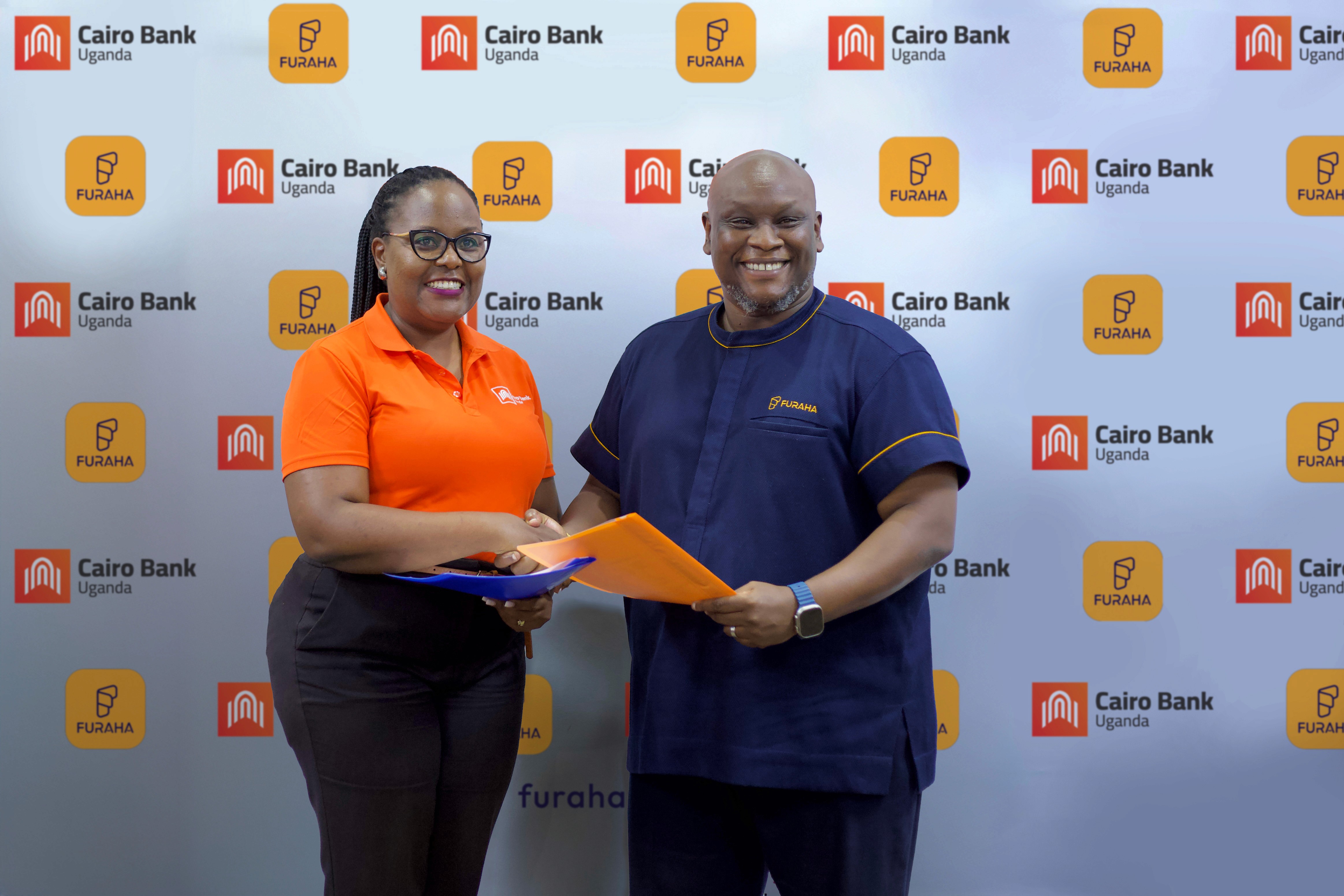 Sylvia Jagwe Owachi (Managing Director, Cairo Bank Uganda) and Dennis Musinguzi (CEO, Furaha) during the announcement of the partnership to expand access to education financing meant to benefit over o.jpg has been uploaded