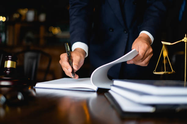 Close up of man going over finance papers
