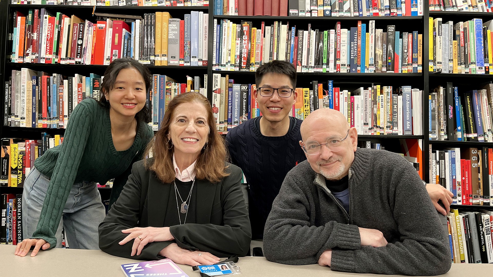 Class of 21 Michael Kao visits MFAD, group shot in library