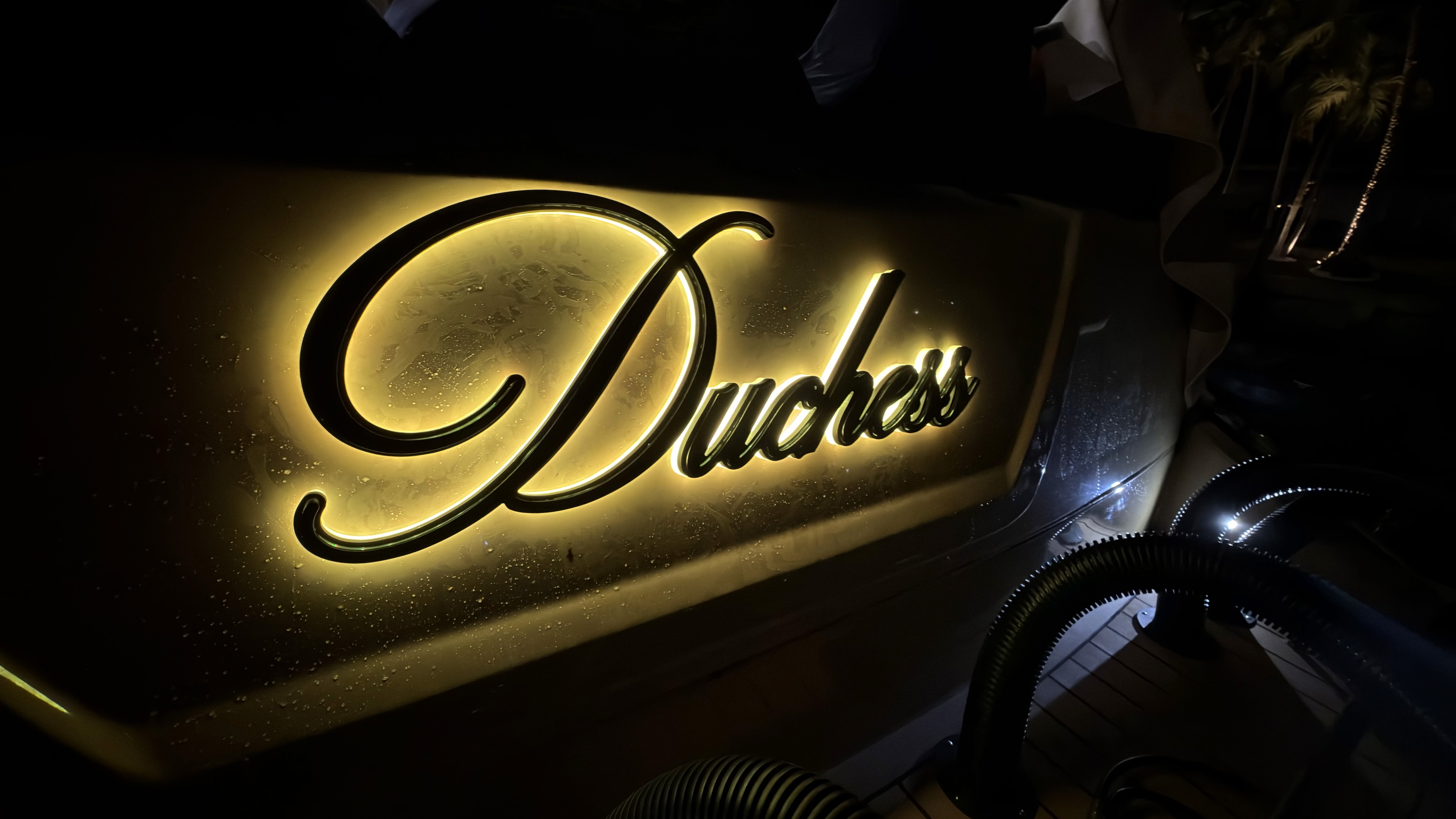 3D illuminated yacht name lettering with gold LED backlighting on yacht Duchess