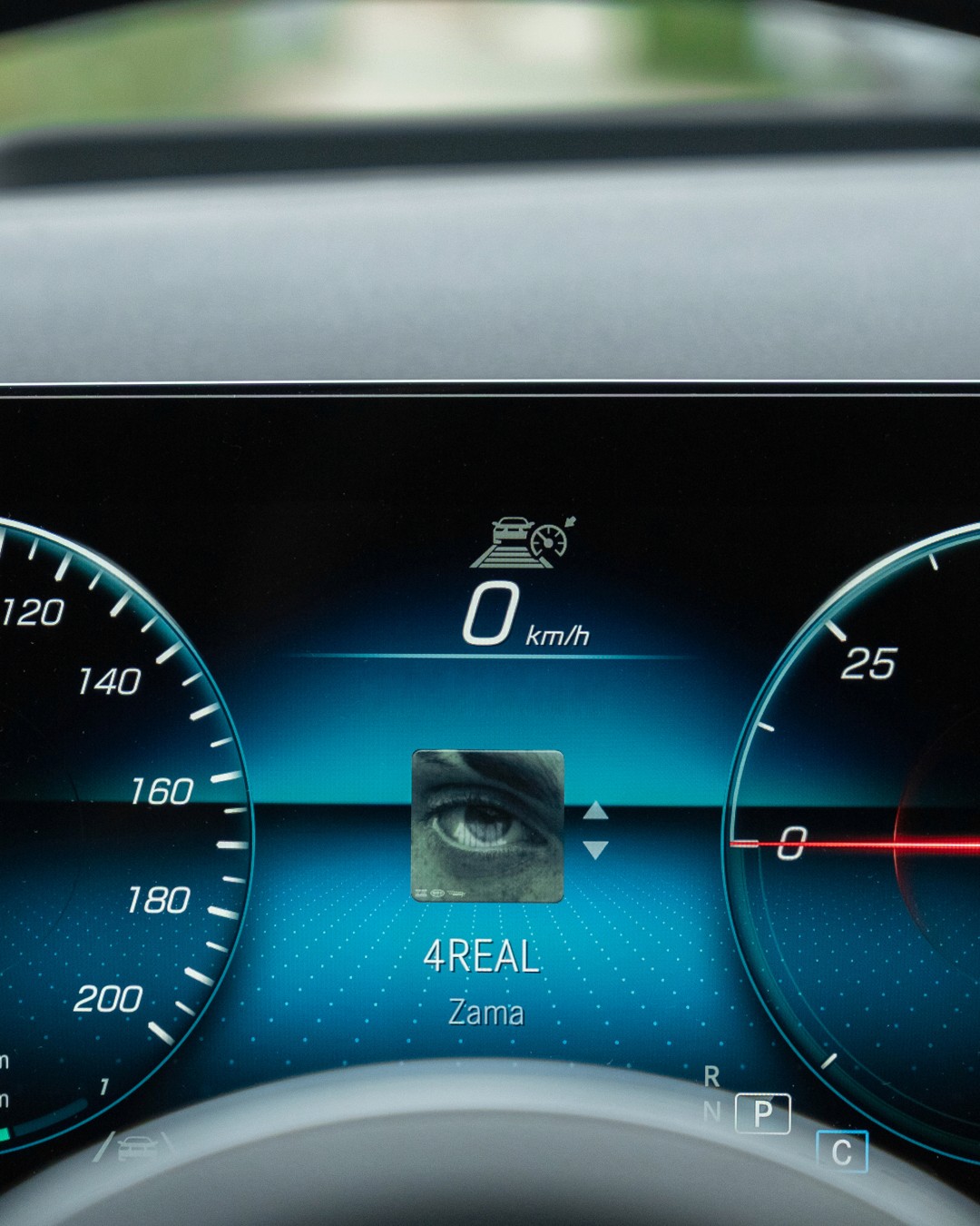 aesthetic blue photo of a blonde woman in black clothes