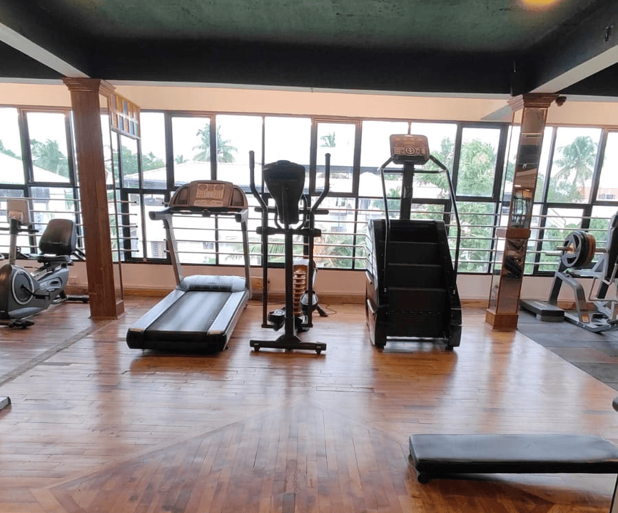 Woman using cross trainers for exercise