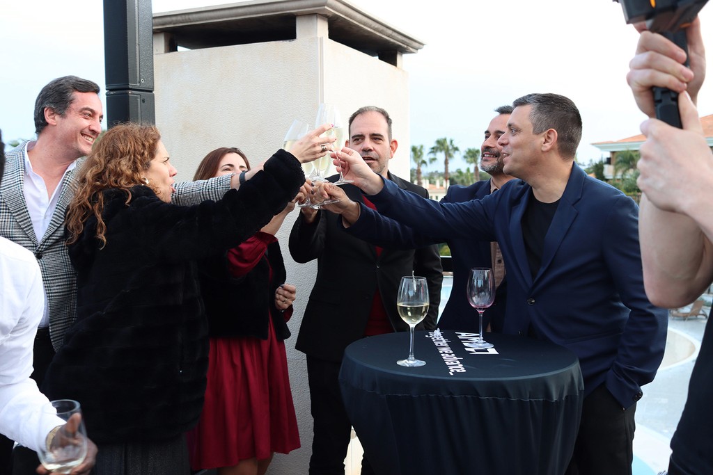 Group of people toasting glasses at the Global Entertainment Awards