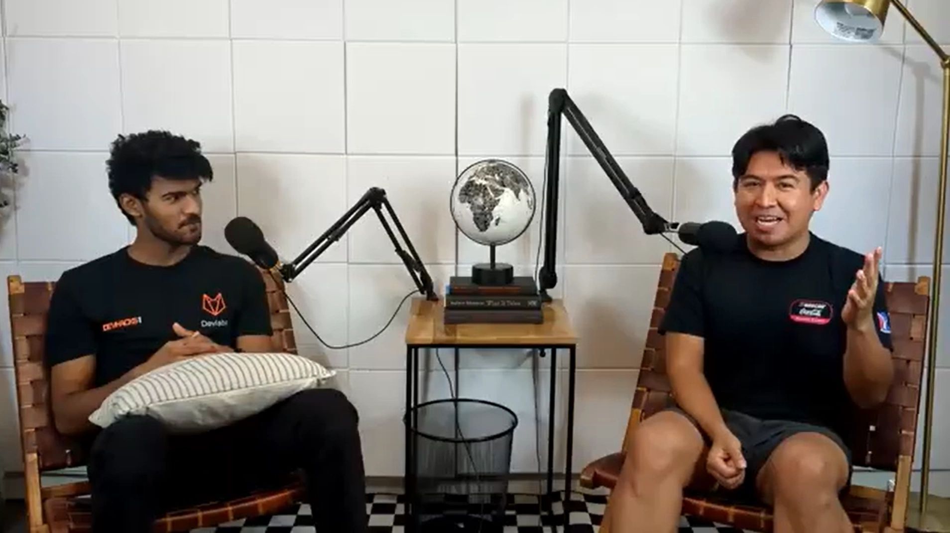 a black and white living room with a large tv