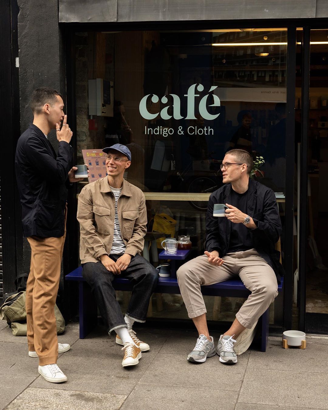 men sitting in front of their laptop computer