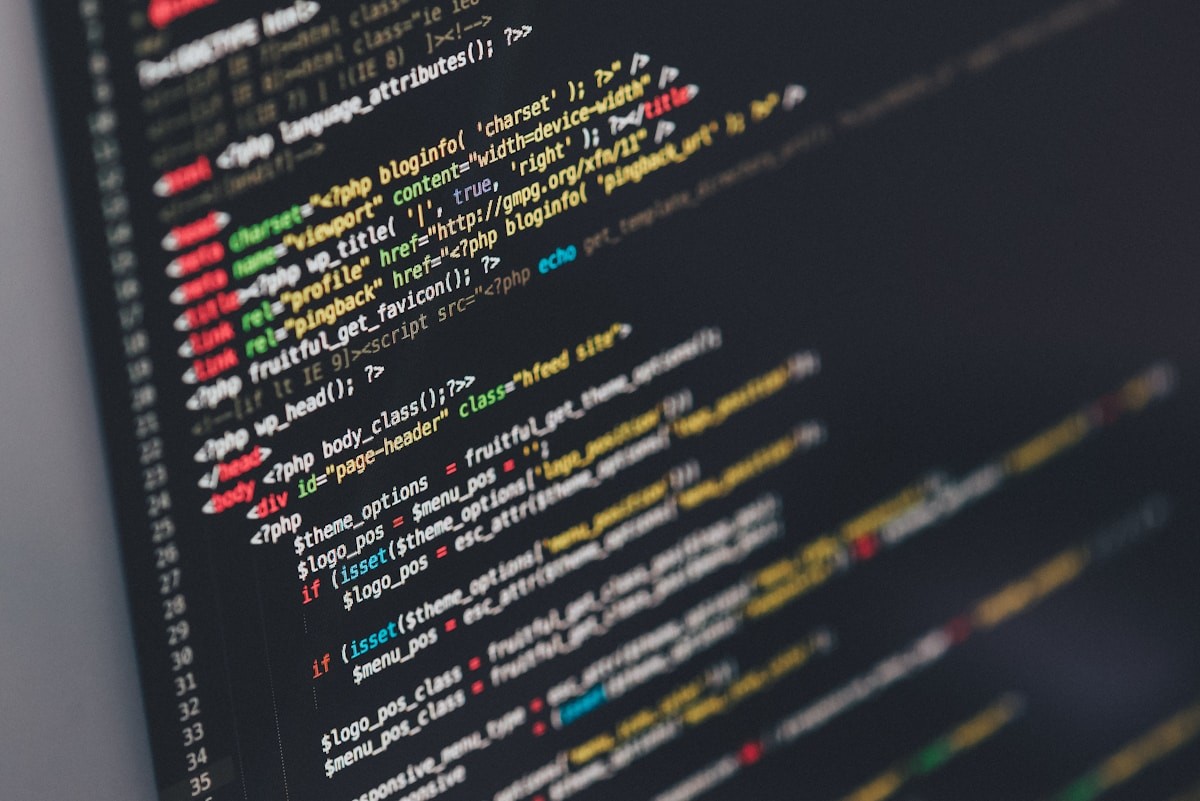 Developer writing code for mobile app