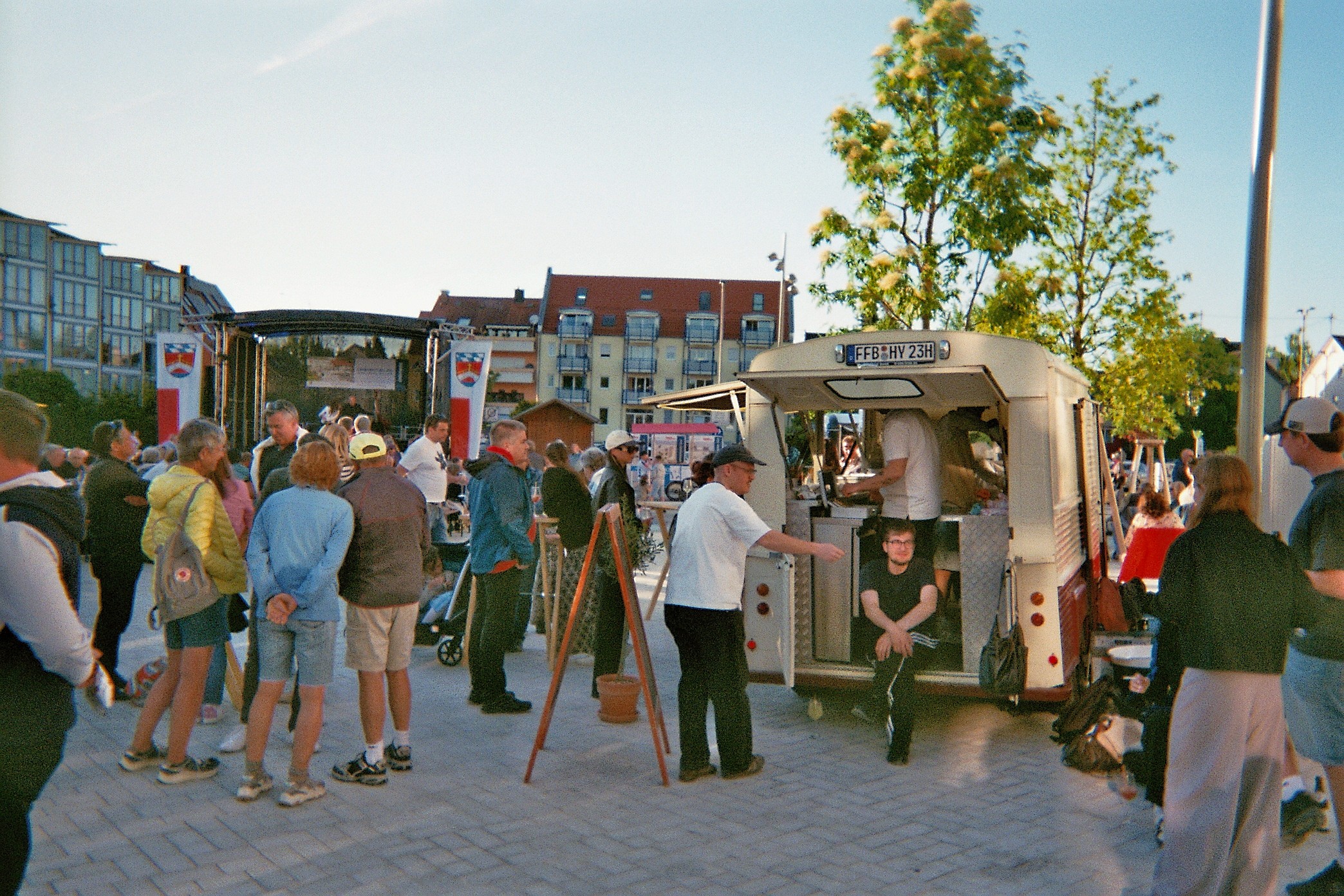 a woman in a dress sitting on a couch