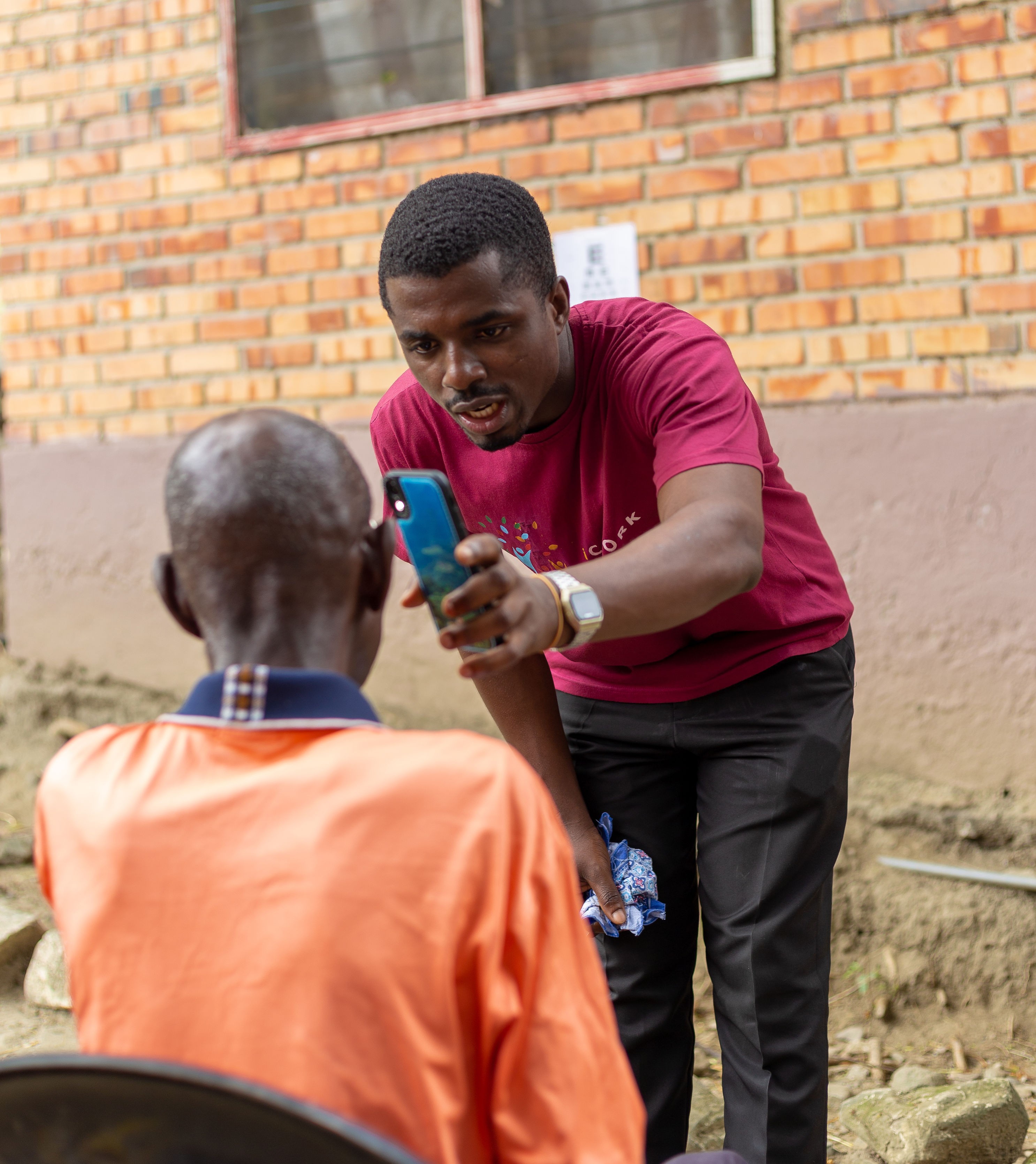 woman in blue denim jacket wearing eyeglasses