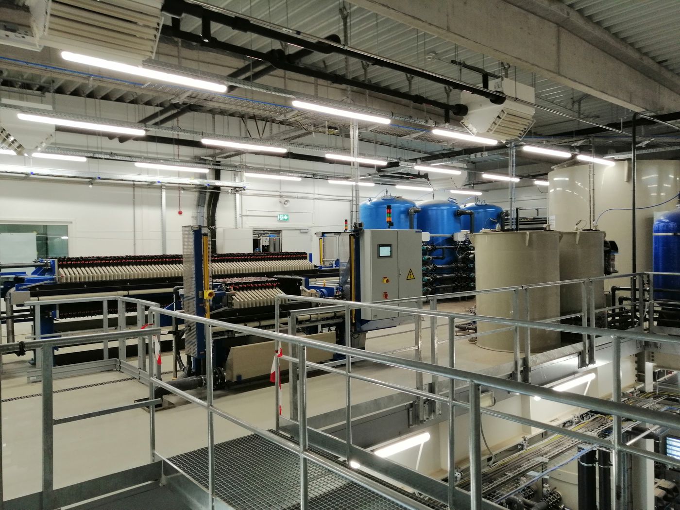 Process hall with filter press and chemical tanks at the Volta Energy wastewater plant, Tatabánya, Hungary