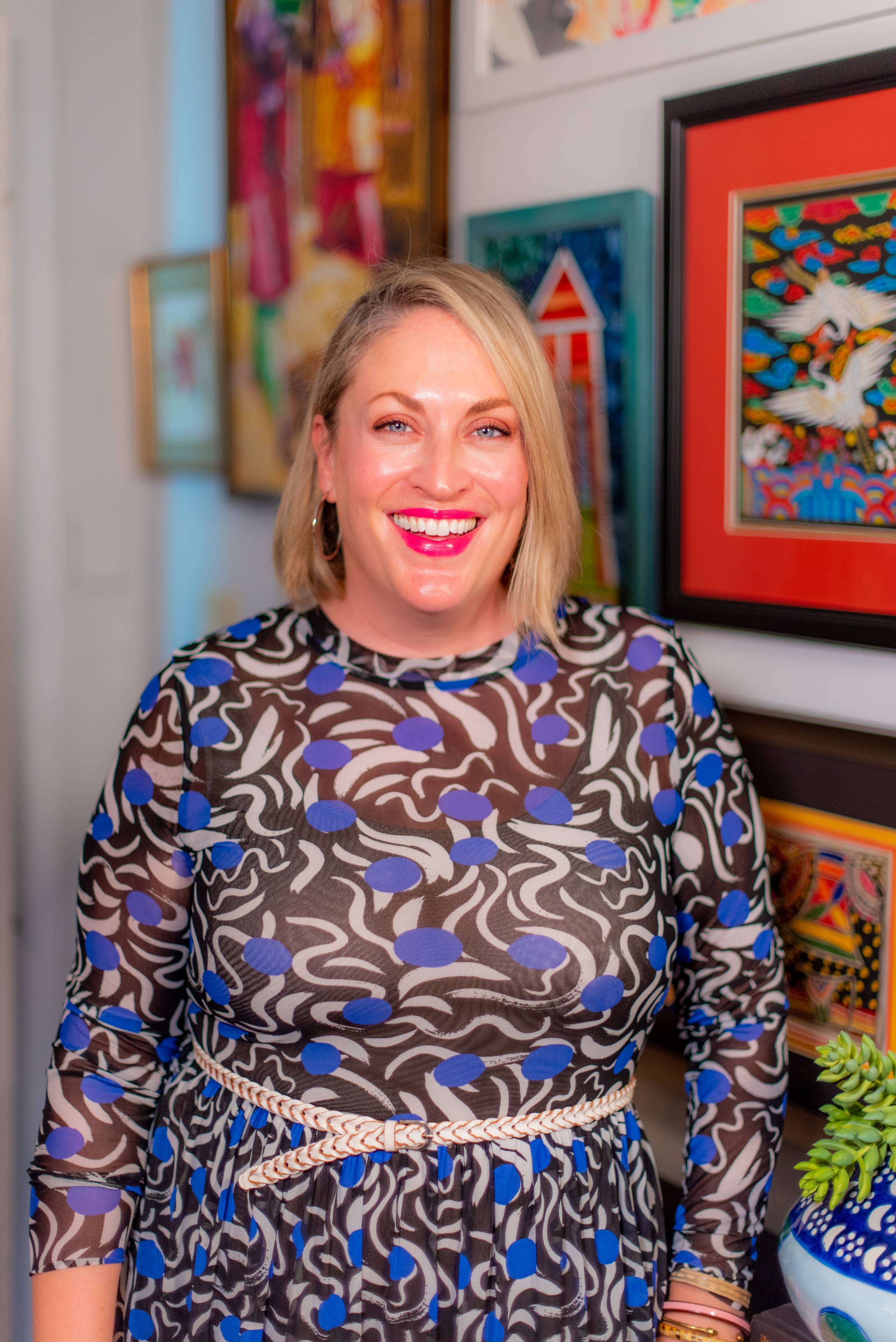 woman in blue dress smiling