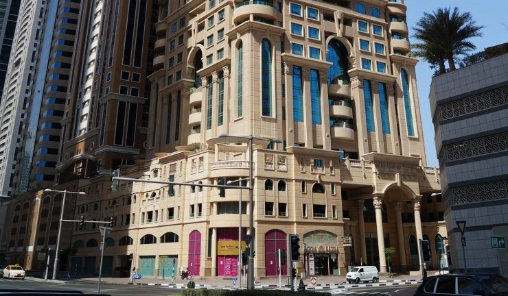 Marina Crown building exterior. Professional real estate services for investors seeking high-yield Dubai properties.