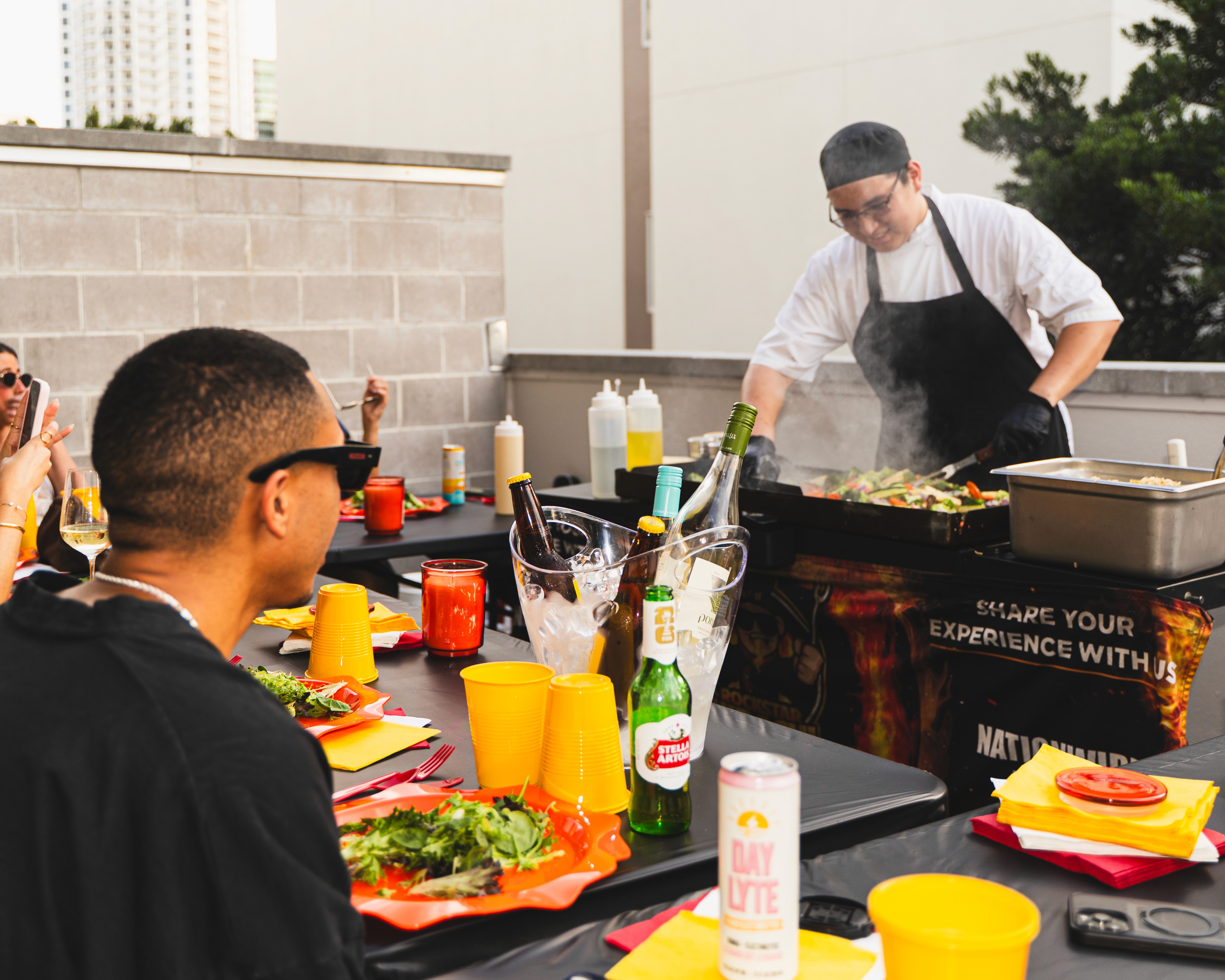 A man cooking a hibachi dinner