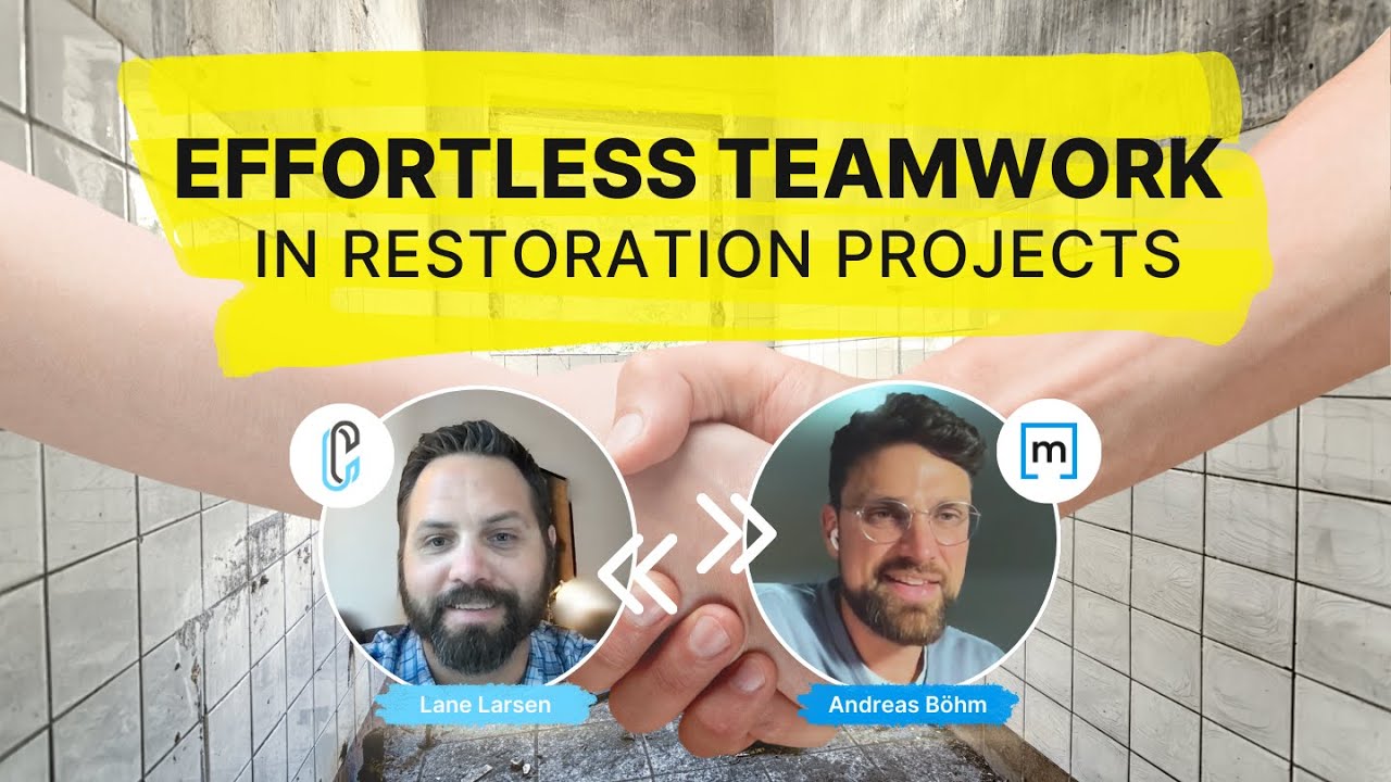 two professional restorers shaking hands