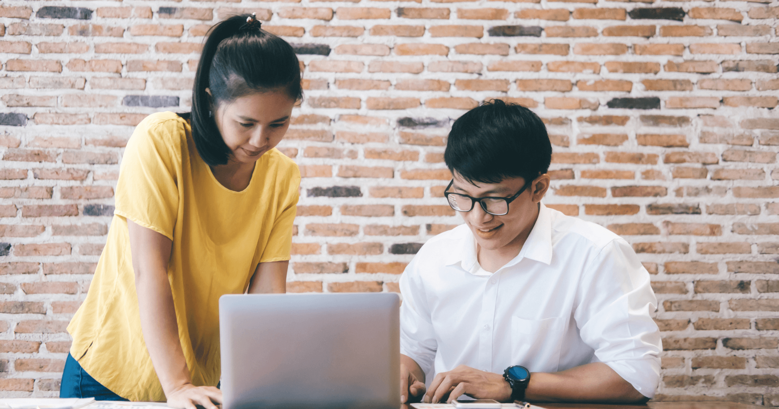 Owner and staff reviewing customer feedback