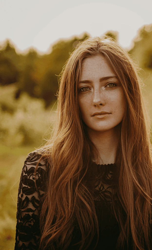 girl standing in a park