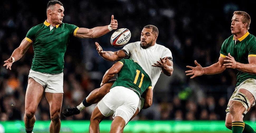 Image of Springboks celebrating victory agasint the new zealand all blacks