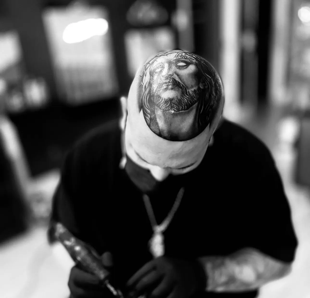 man praying with pierced ears in austin
