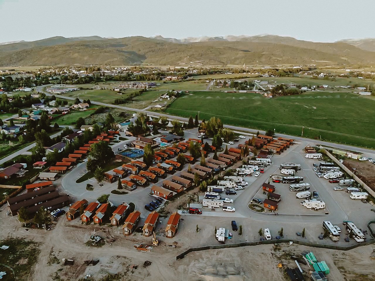 Teton Valley Resort Cabins from above, showing the entire resort's location near the Teton Mountains..