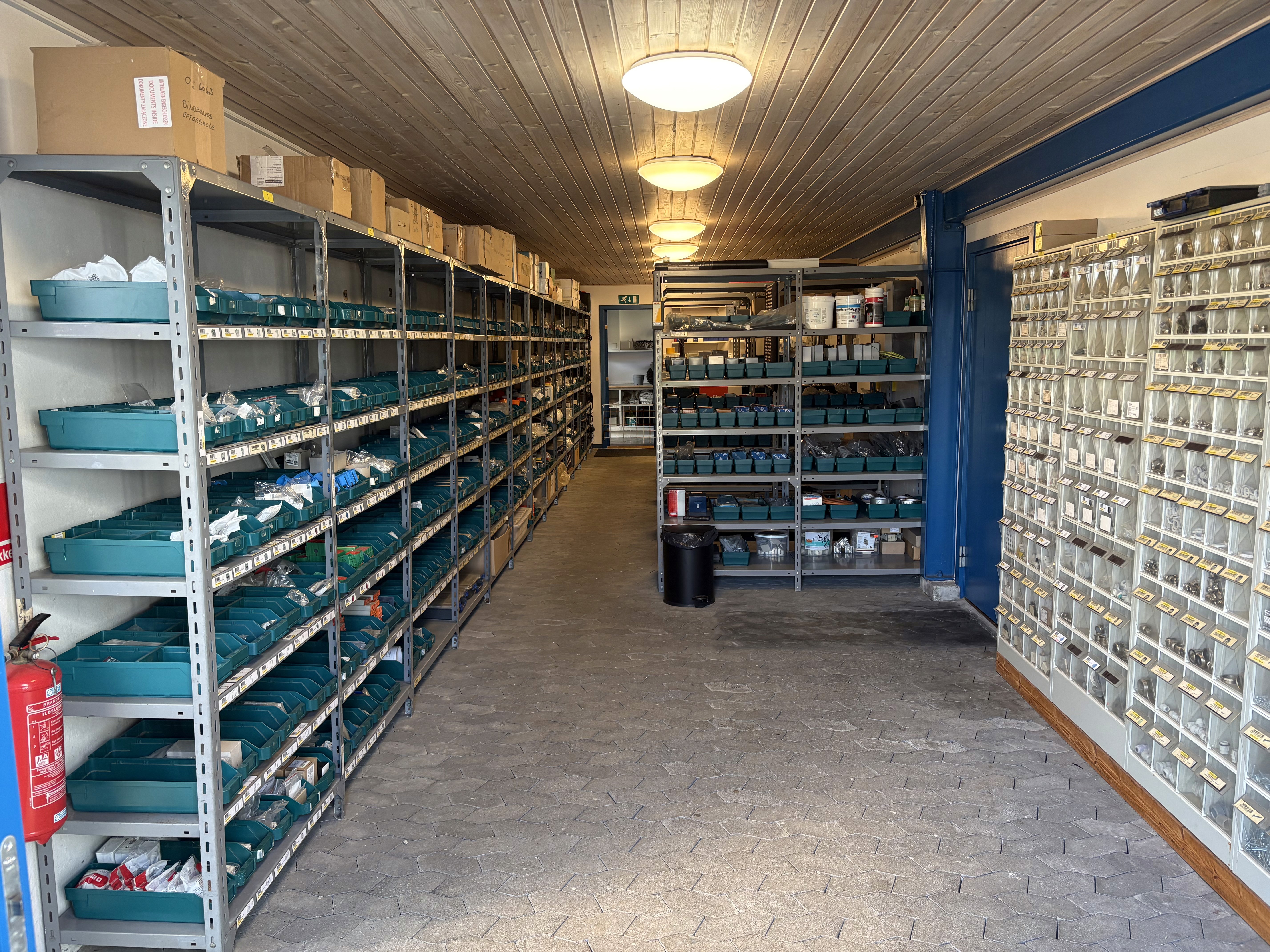 white ceramic bathtub near white framed window