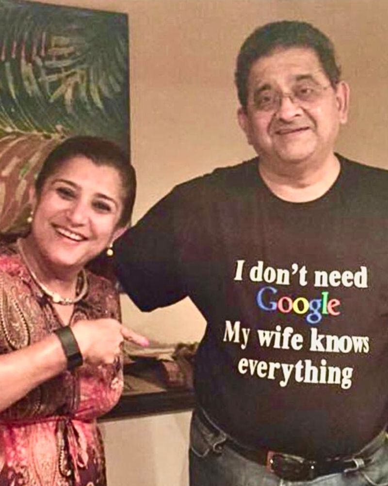 Rajesh Nagjee with his wife Sejal, wearing a t-shirt that reads: I don't need Google, my wife knows everything.