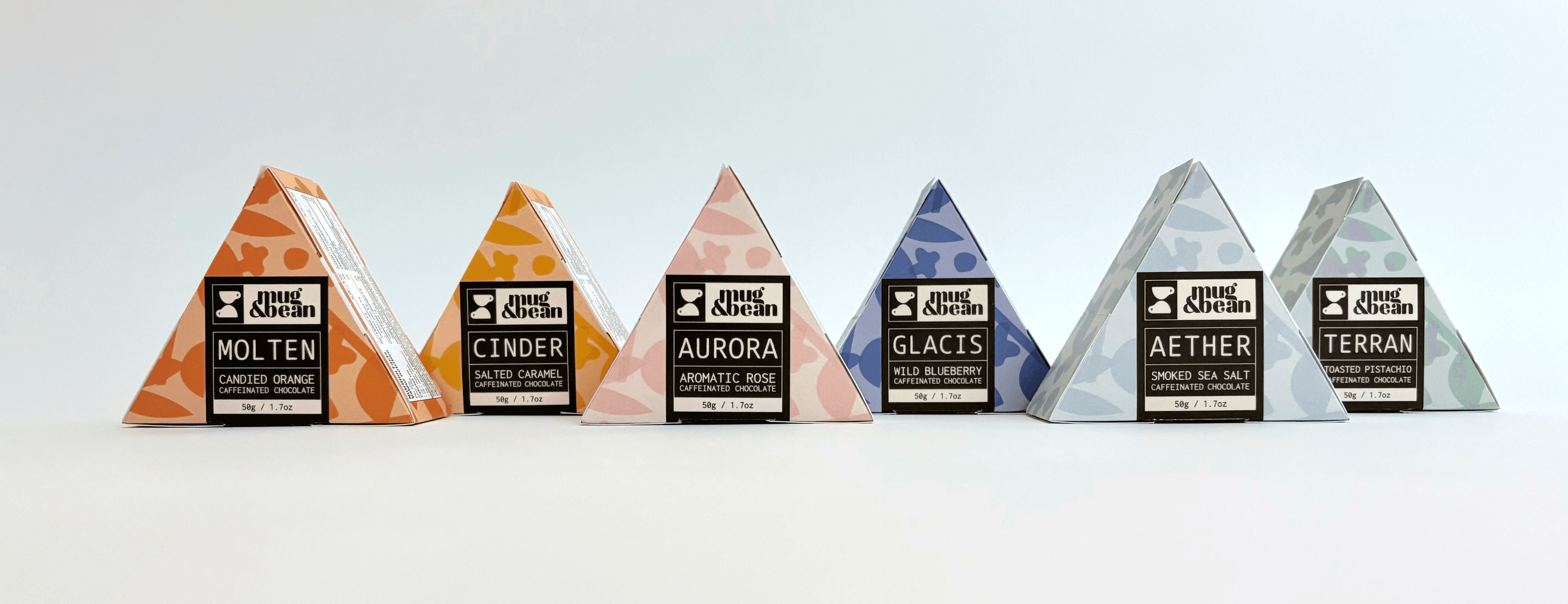 Modern home office setup with a monitor, ergonomic chair, keyboard, and indoor plants near a window with blinds.