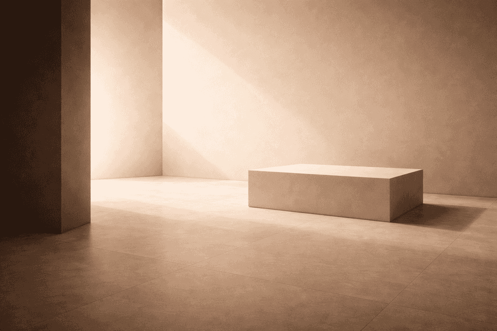 two people sitting at a table with laptops