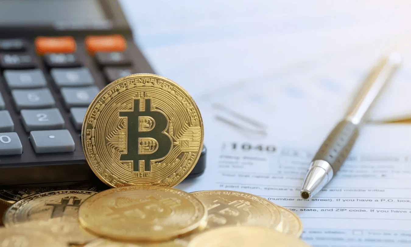 Bitcoin coins on a tax form -  How to Calculate Crypto Gains 