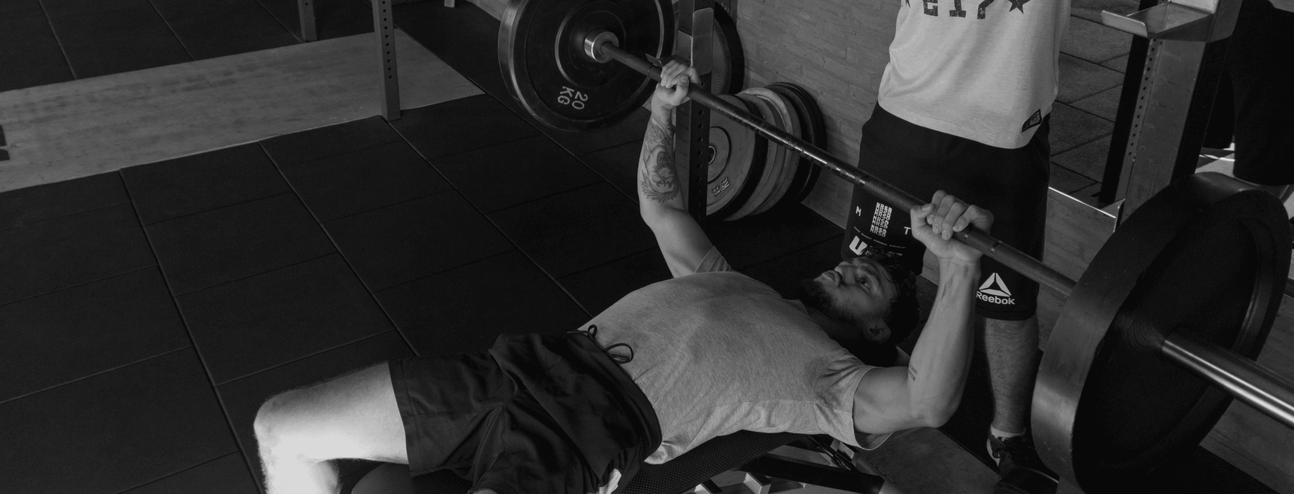 Fit man lifting weights