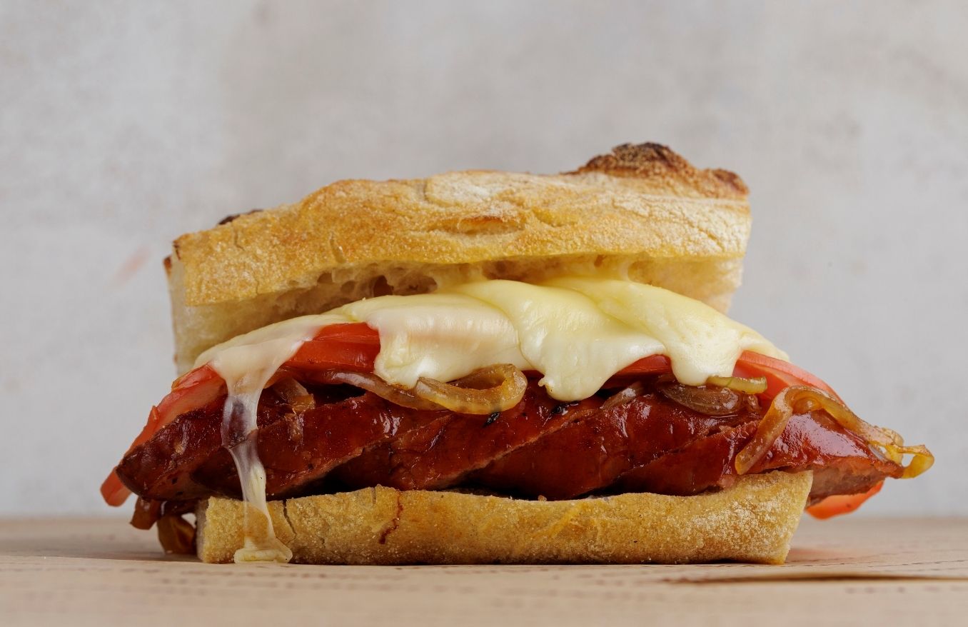 Chorizo Sausage, caramelised onion, tomatoes and cheese sandwich