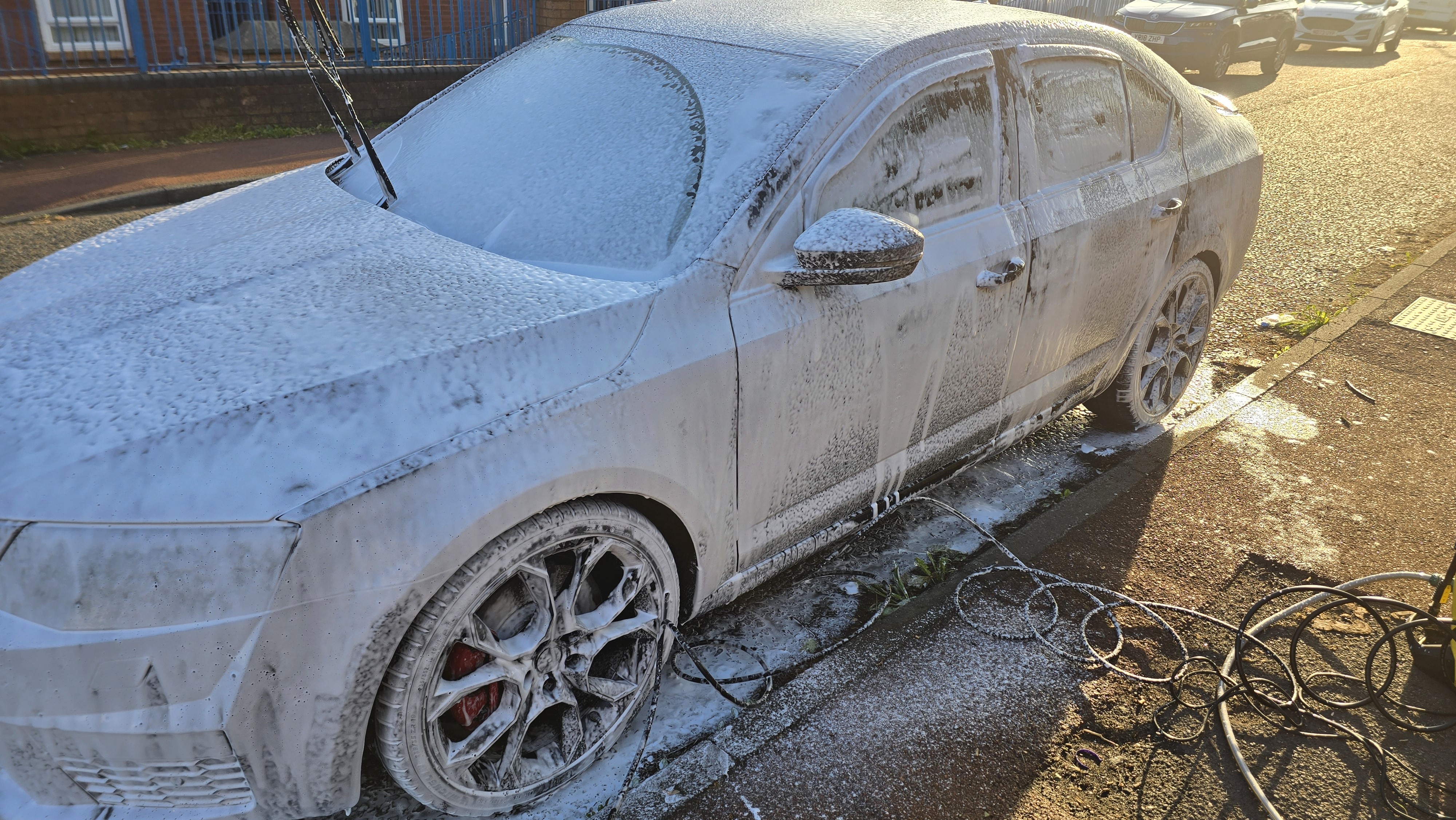 Black Škoda Octavia vRS during paint-safe washing