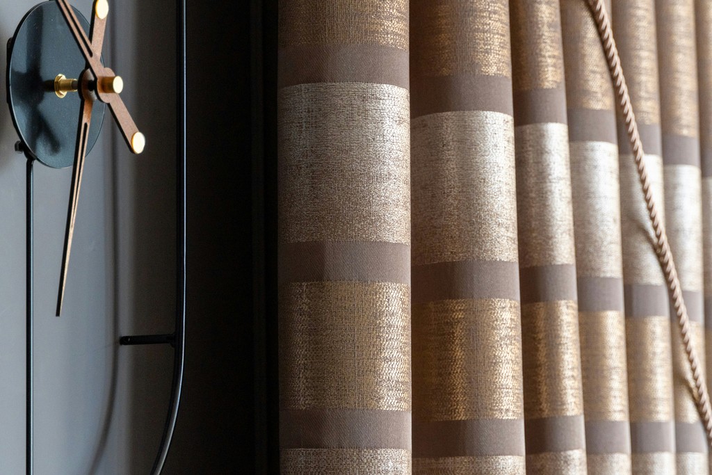 a clock that is on the side of a wall