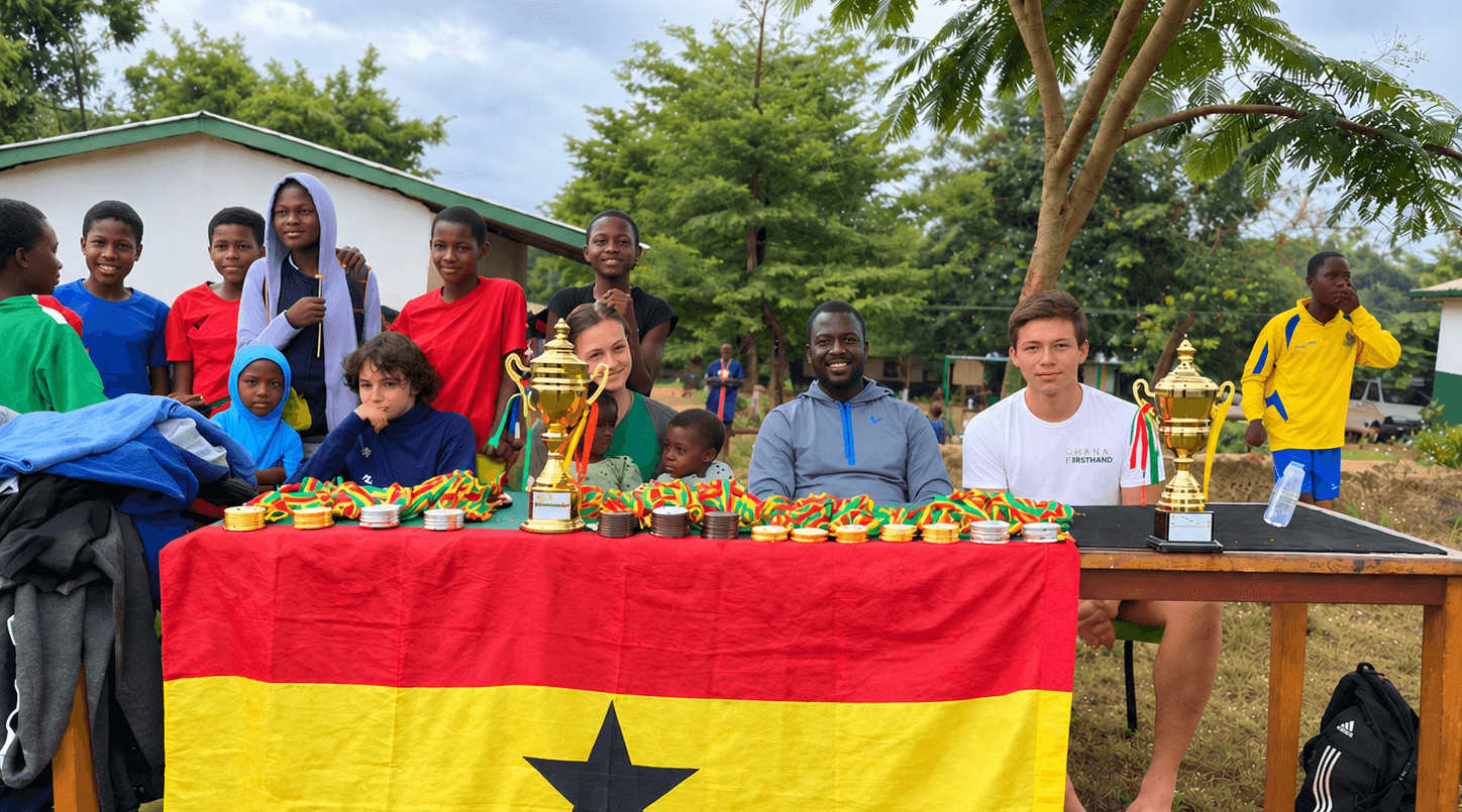 Ghana-Flagge, Pokale, Medaillen und Sportgemeinschaft